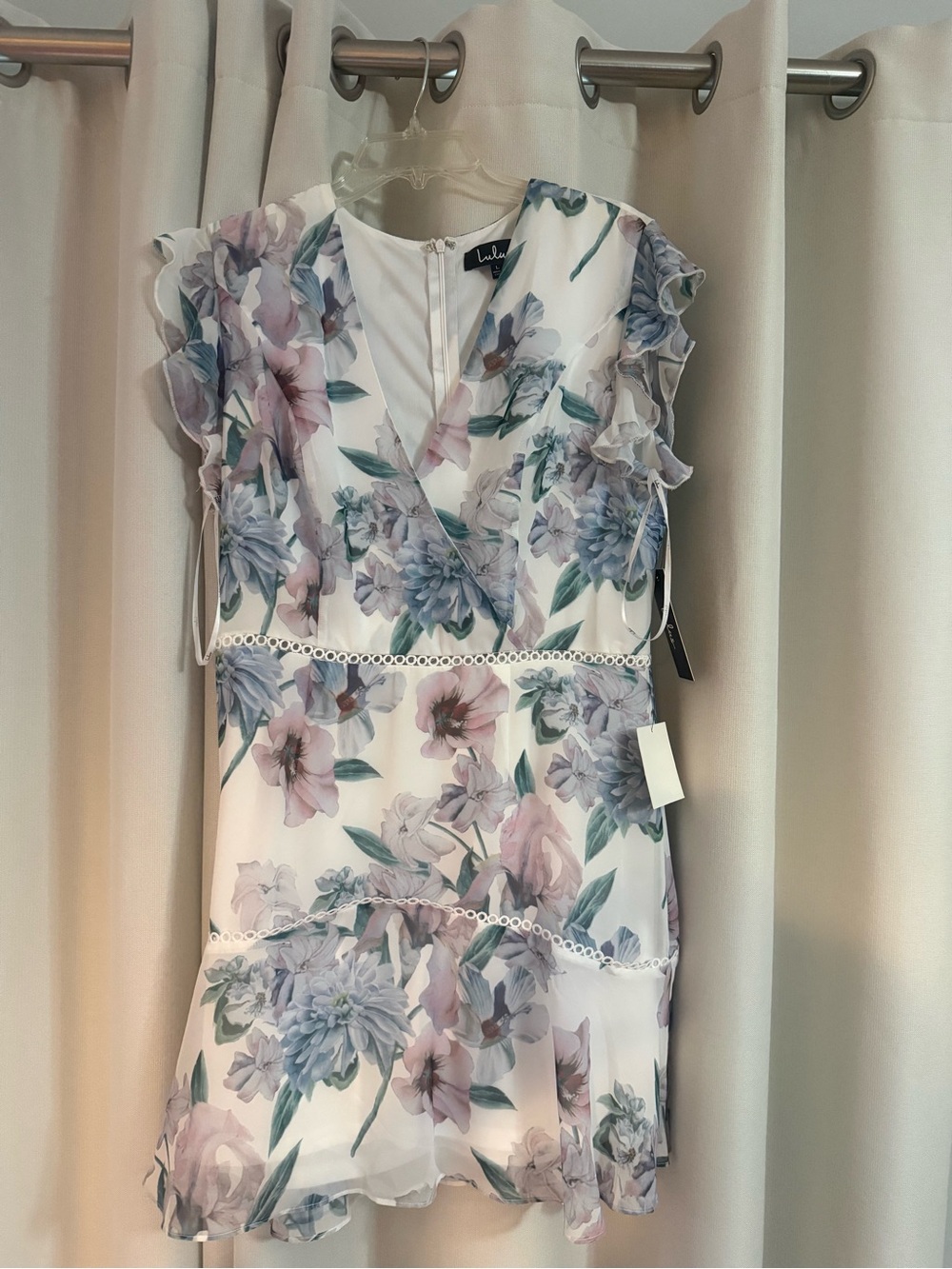 Lulu's White Floral Ruffle V-Neck Mini Dress with Pastel Pink & Blue Blooms